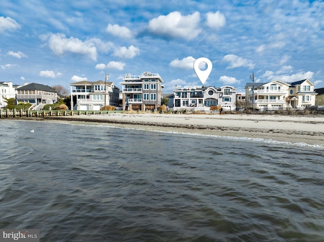 property view of water featuring a view of the beach