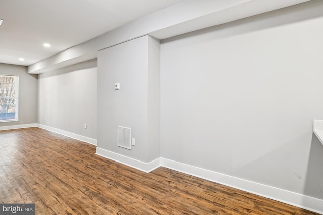 basement with wood-type flooring