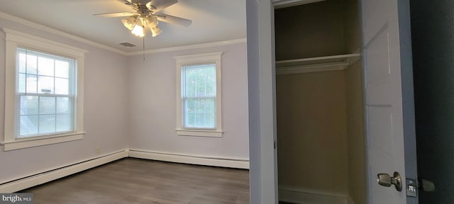 closet with a baseboard heating unit