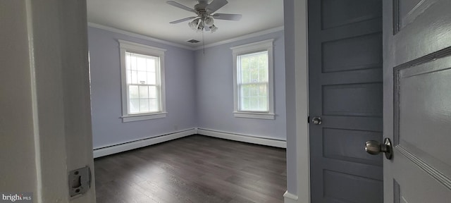 spare room with dark hardwood / wood-style floors, ceiling fan, ornamental molding, and a baseboard radiator