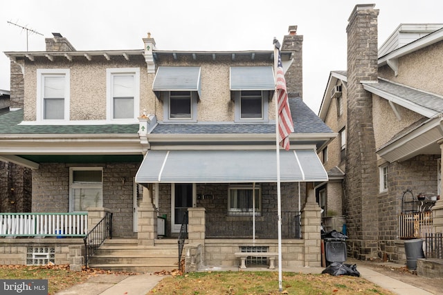 view of front of house featuring covered porch