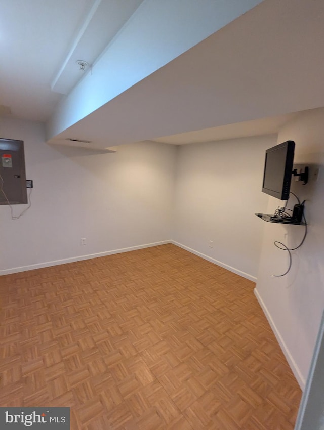 basement featuring light parquet floors