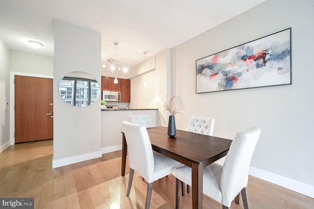 dining area featuring light hardwood / wood-style flooring