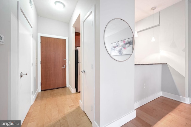 hall featuring light wood-type flooring