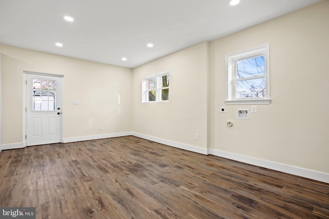 entryway with recessed lighting, dark wood-style flooring, and baseboards