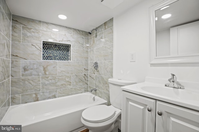 full bathroom featuring recessed lighting, shower / washtub combination, toilet, and vanity