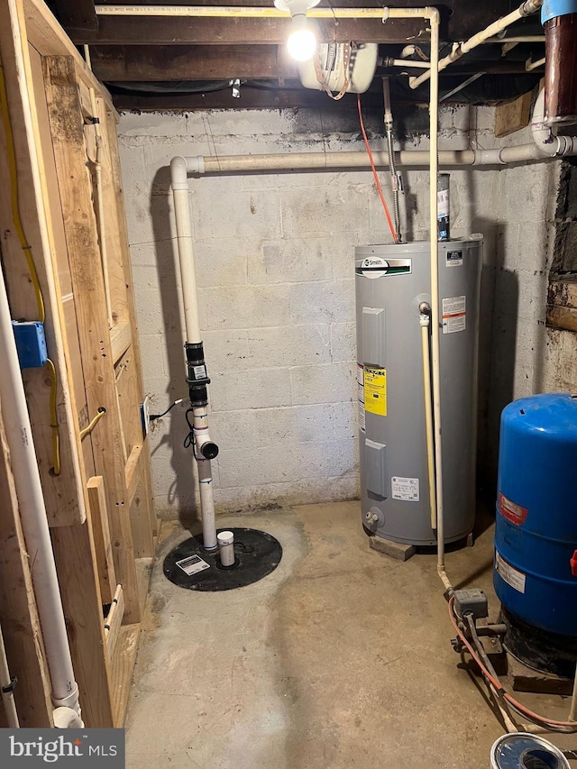 utility room with electric water heater