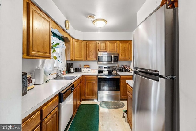 kitchen featuring appliances with stainless steel finishes and sink