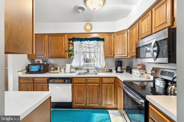 kitchen featuring sink and stainless steel appliances