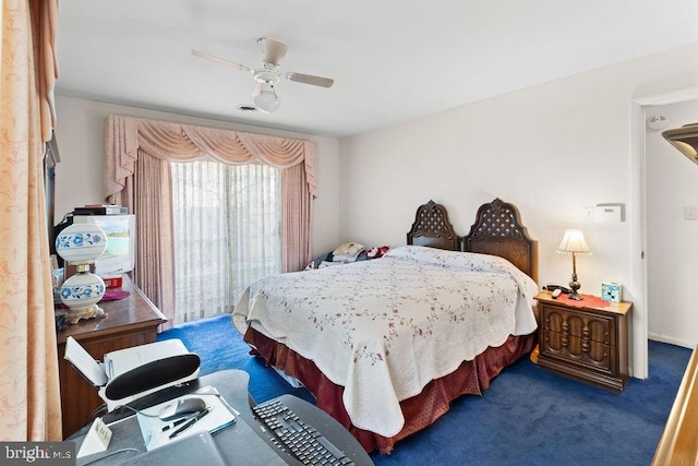 carpeted bedroom featuring ceiling fan