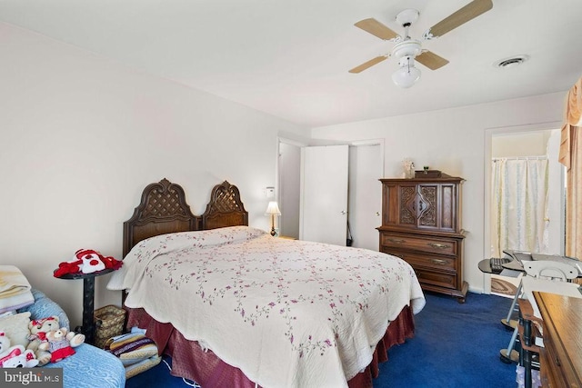 carpeted bedroom featuring ceiling fan