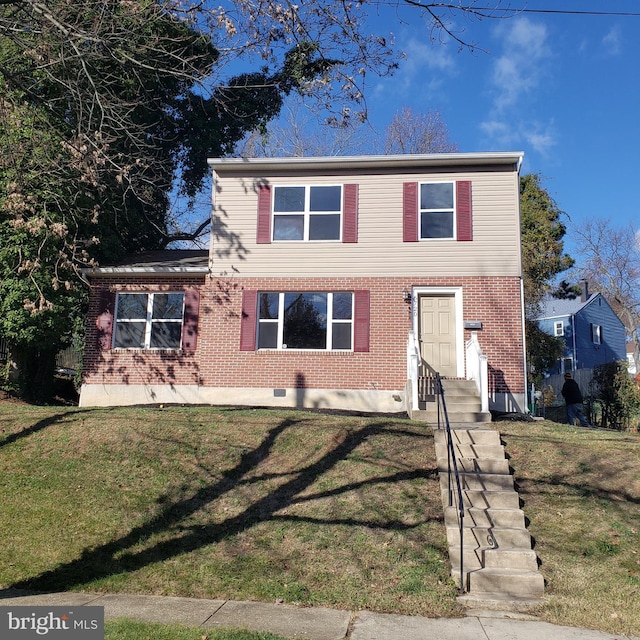 view of front of house with a front yard