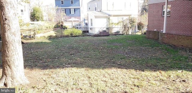 view of yard with central AC unit