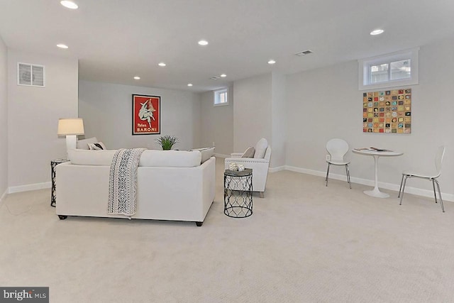 living room with light colored carpet