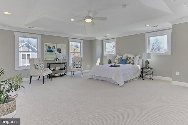 bedroom with multiple windows, light colored carpet, ceiling fan, and crown molding