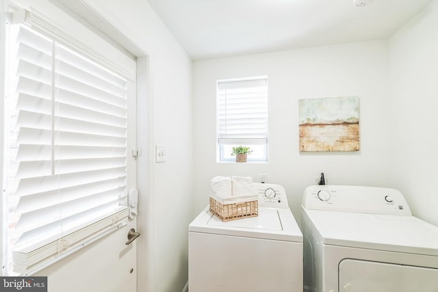 washroom with washer and clothes dryer