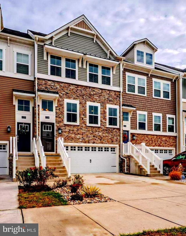 townhome / multi-family property featuring a garage