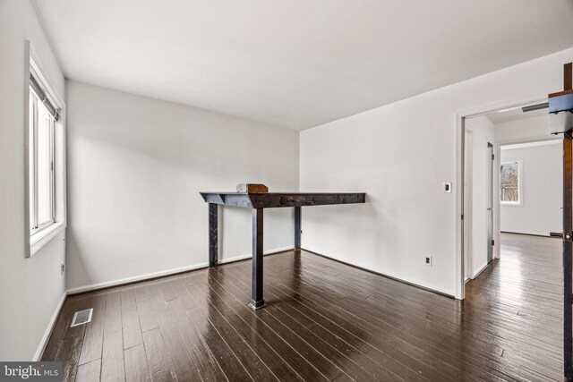 interior space featuring dark wood-type flooring