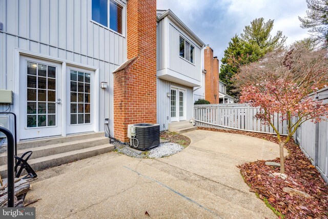 view of patio / terrace featuring french doors and central AC