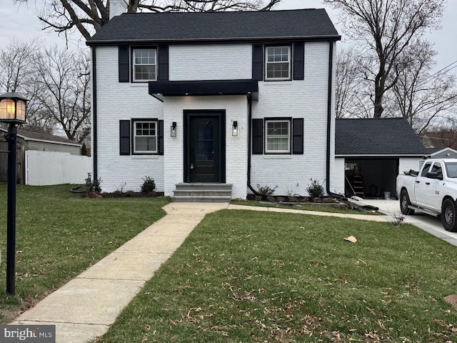 view of front of home with a front lawn