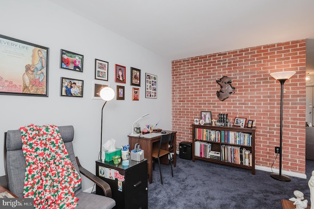 living area with dark carpet