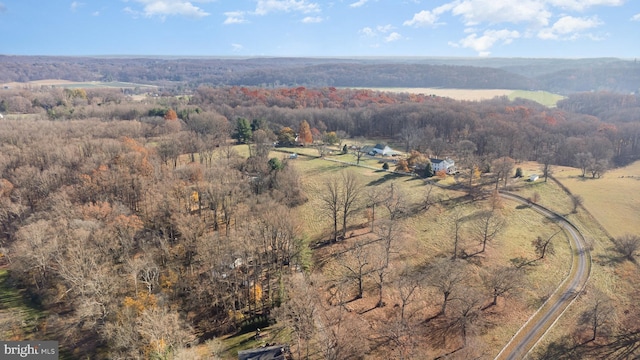 birds eye view of property featuring a rural view