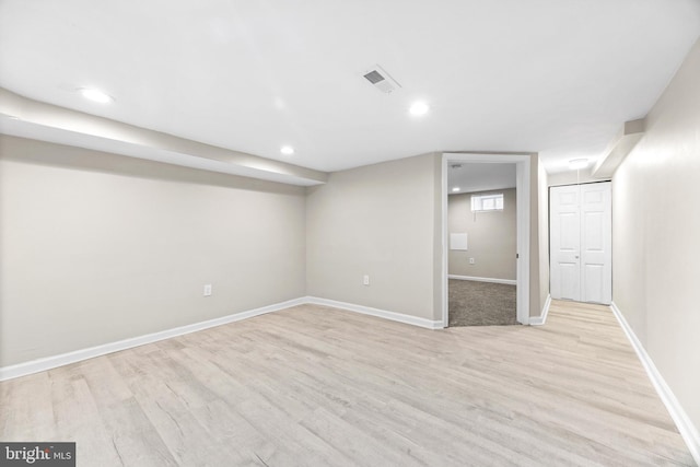 basement with light wood-type flooring