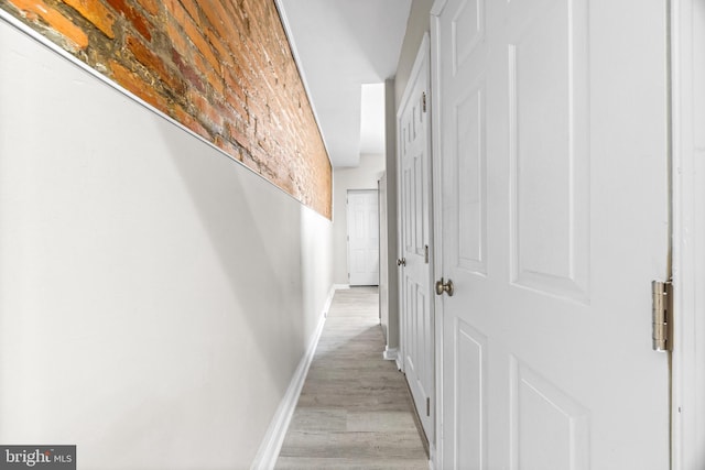 hallway featuring light wood-type flooring