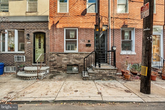 entrance to property with a patio area