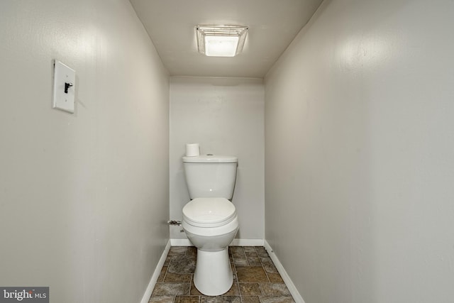 bathroom featuring toilet