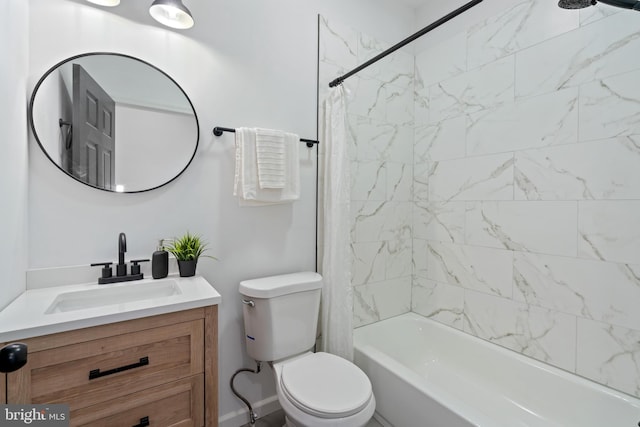 full bathroom featuring vanity, toilet, and tiled shower / bath