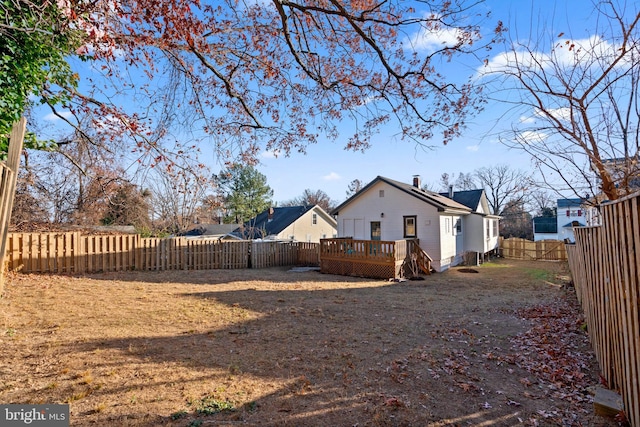 rear view of property with a deck