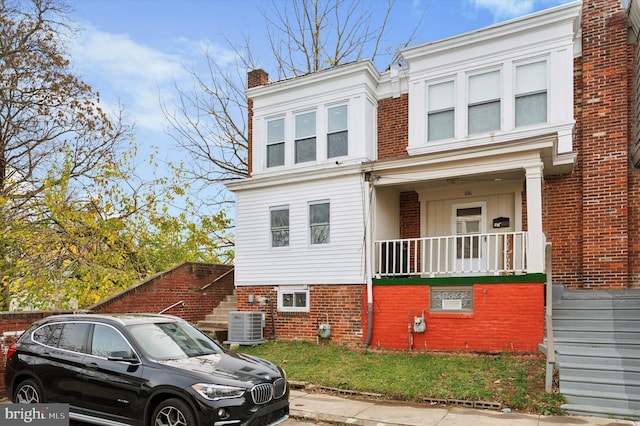 view of front of home with central air condition unit