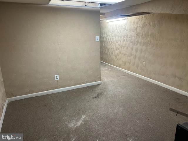 basement with carpet flooring