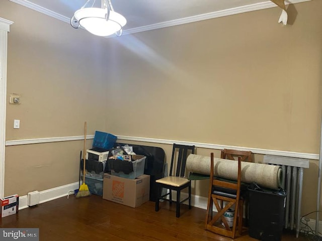 interior space featuring dark hardwood / wood-style floors and ornamental molding