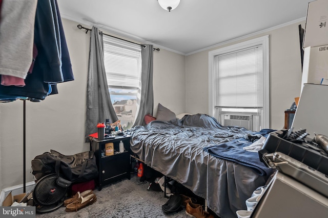 bedroom featuring cooling unit and ornamental molding