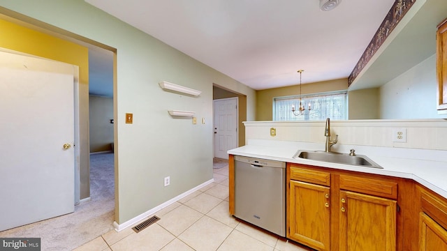 kitchen with stainless steel dishwasher, a chandelier, decorative light fixtures, light colored carpet, and sink