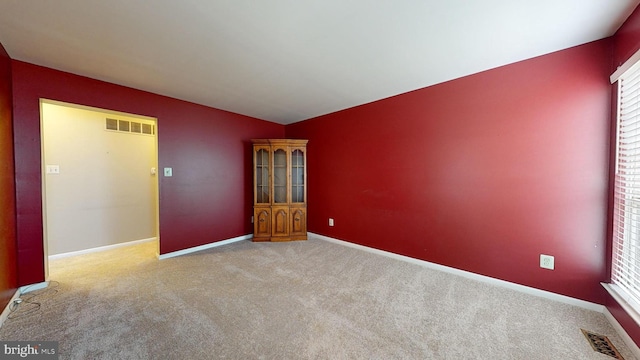 view of carpeted spare room