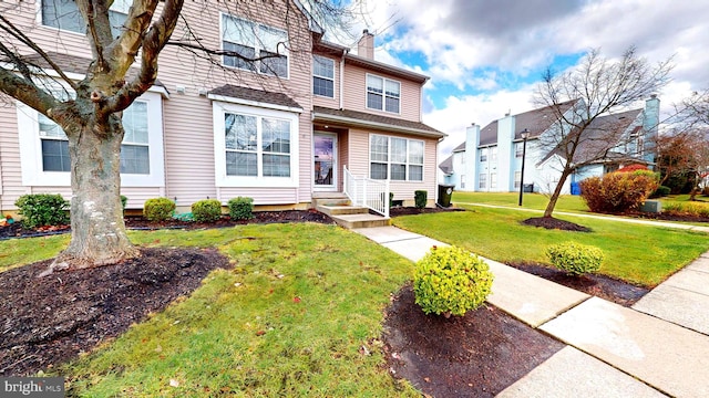 view of front of house with a front yard