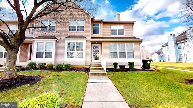 view of property with a front lawn