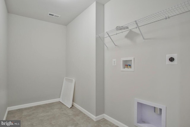 laundry area featuring hookup for an electric dryer and hookup for a washing machine