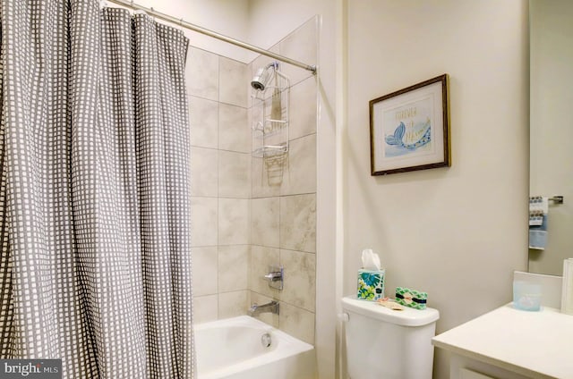 full bathroom featuring vanity, toilet, and shower / tub combo with curtain