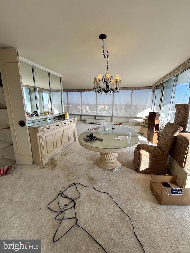 interior space with light colored carpet and a chandelier