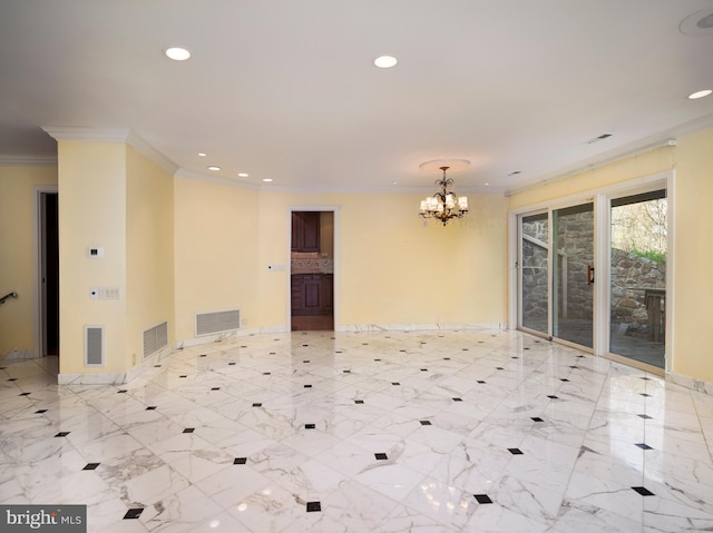 unfurnished room featuring a chandelier and ornamental molding