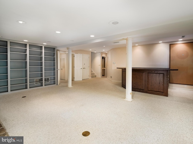 basement featuring light carpet