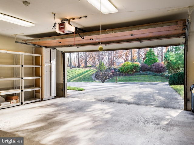 garage featuring a garage door opener