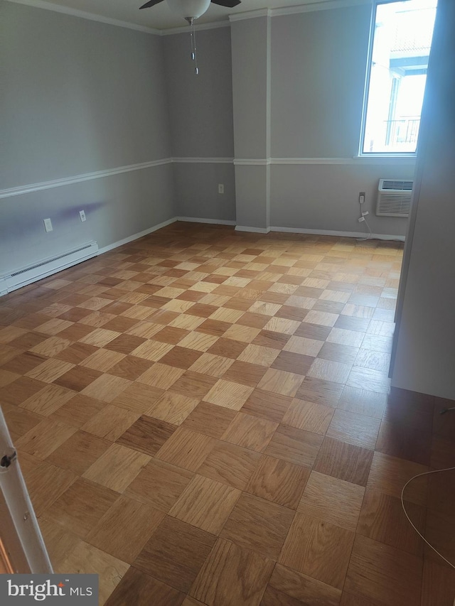 empty room with a wall unit AC, ceiling fan, a baseboard radiator, and ornamental molding