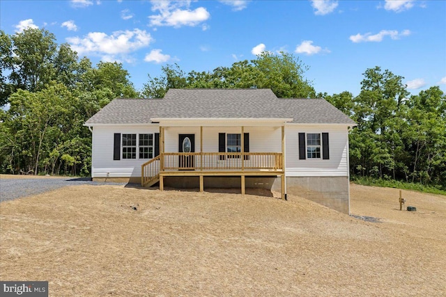 view of front of property featuring covered porch