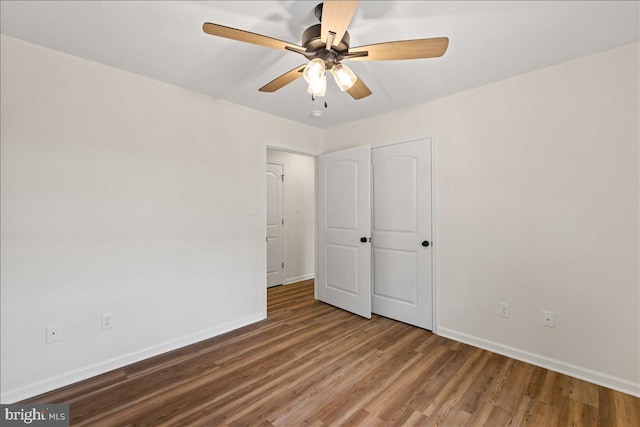 unfurnished bedroom with hardwood / wood-style flooring and ceiling fan