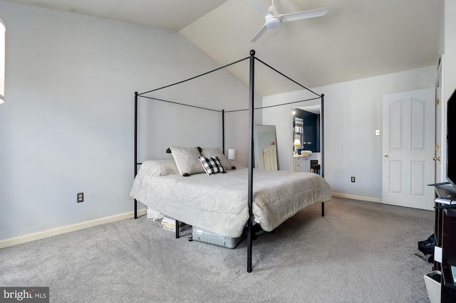 carpeted bedroom featuring vaulted ceiling and ceiling fan